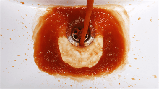 Don't Panic! Here's What to Do About Discolored or Rusty Water Coming from Your Hot Water Heater